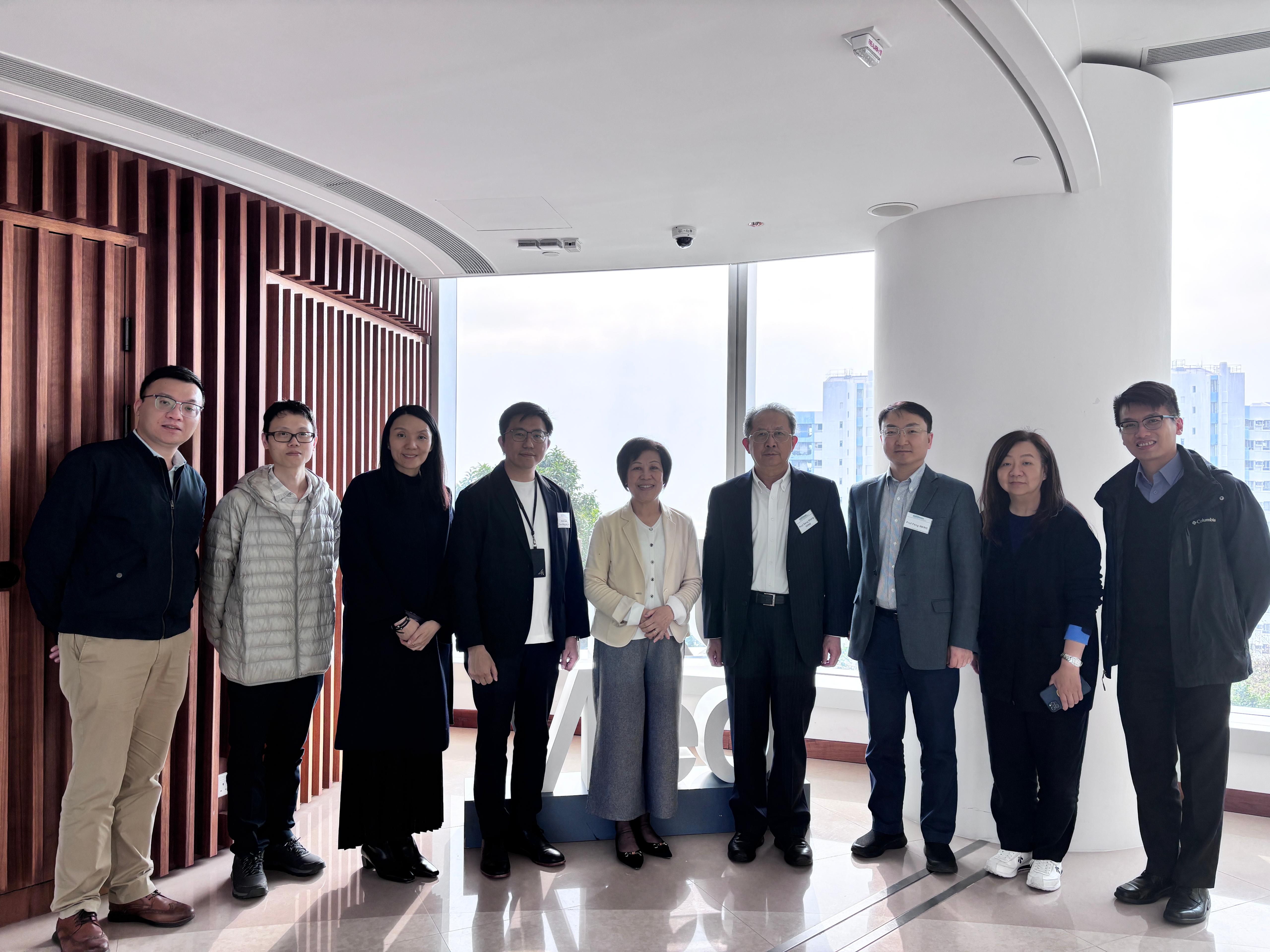 Professor Feng (Right 4), Professor Wang (Right 3), and the TRS Team